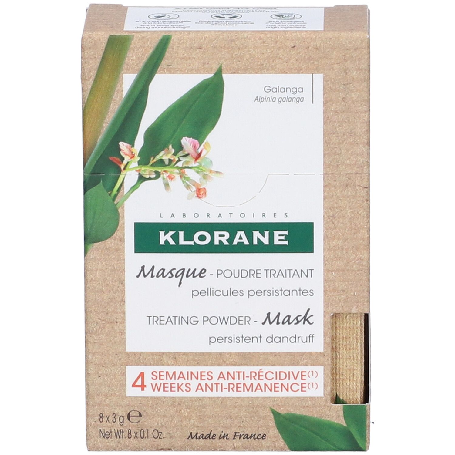 Klorane Maske in Pulverform gegen hartnäckige Schuppen. Kartonverpackung mit Produktabbildung und Text. 8 x 3g Beutel.