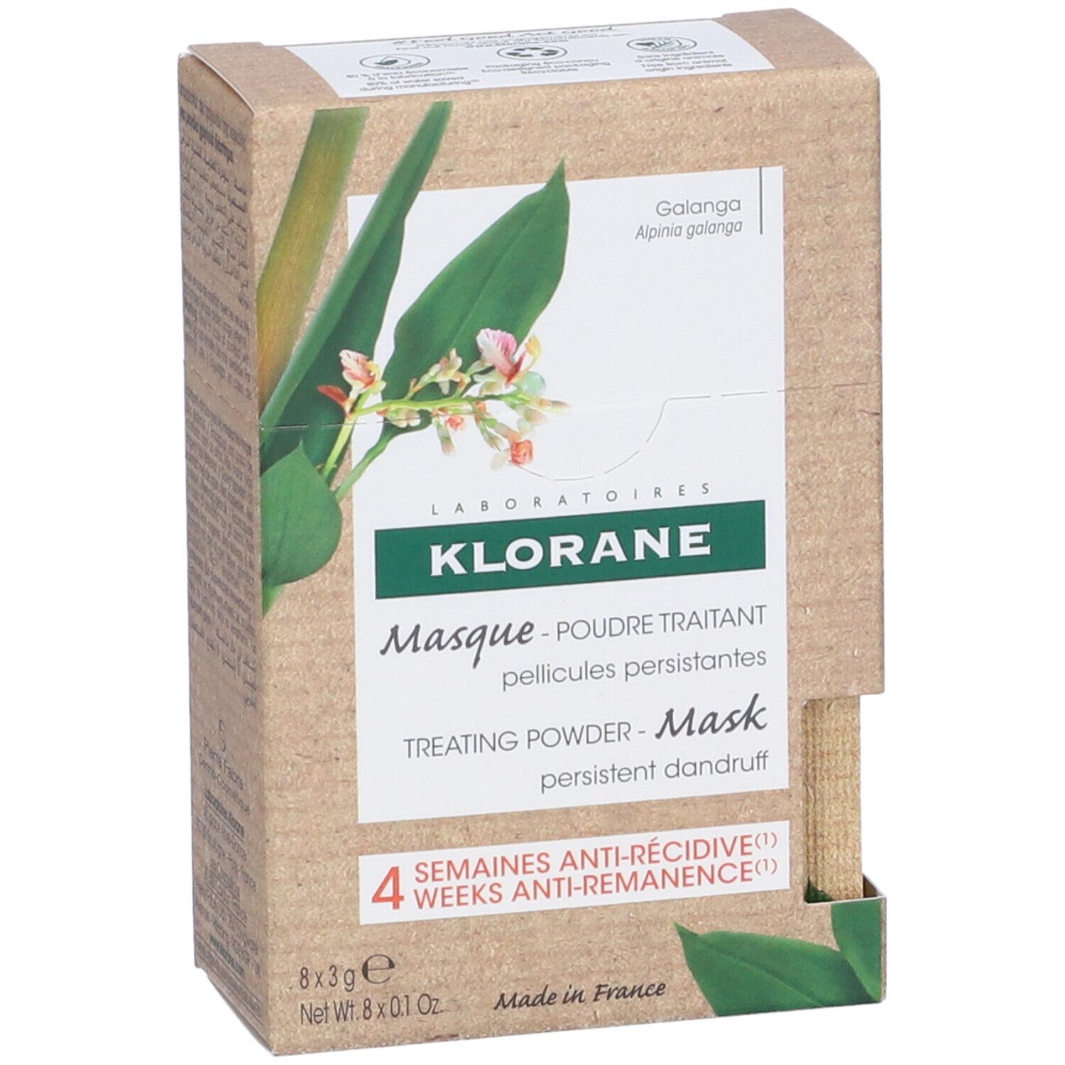 Klorane Maske in Pulverform gegen hartnäckige Schuppen. Kartonverpackung mit Produktabbildung und Text. 8 x 3g Beutel.