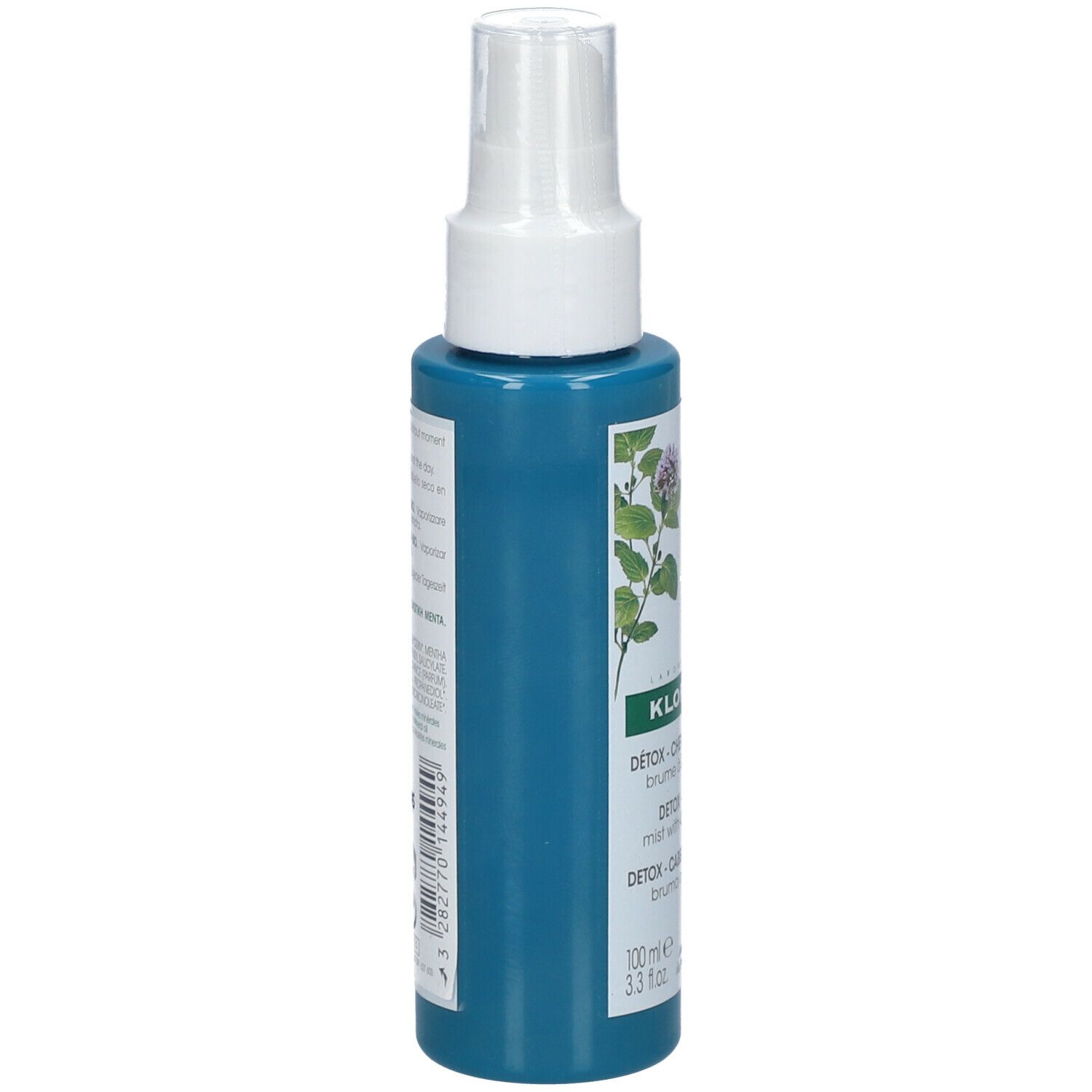 Retro del flacone spray. Testo con informazioni prodotto, ingredienti e dati del produttore.