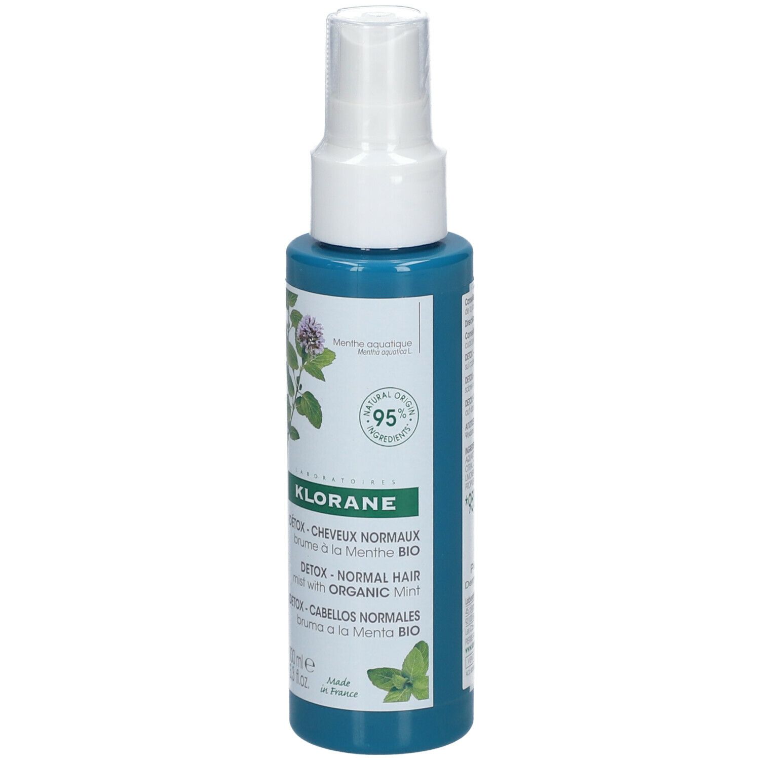 Flacone spray turchese con erogatore bianco. Etichetta con nome prodotto, illustrazione menta e 95% ingredienti naturali.