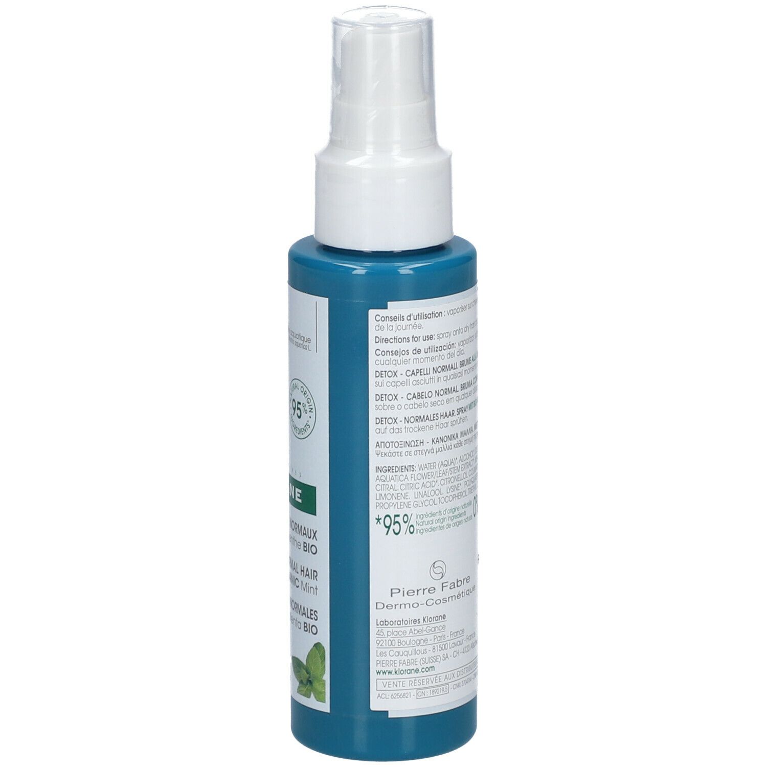 Retro del flacone spray. Testo con informazioni prodotto, ingredienti e dati del produttore.