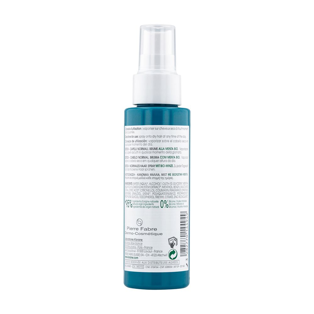 Retro del flacone spray. Testo con informazioni prodotto, ingredienti e dati del produttore.