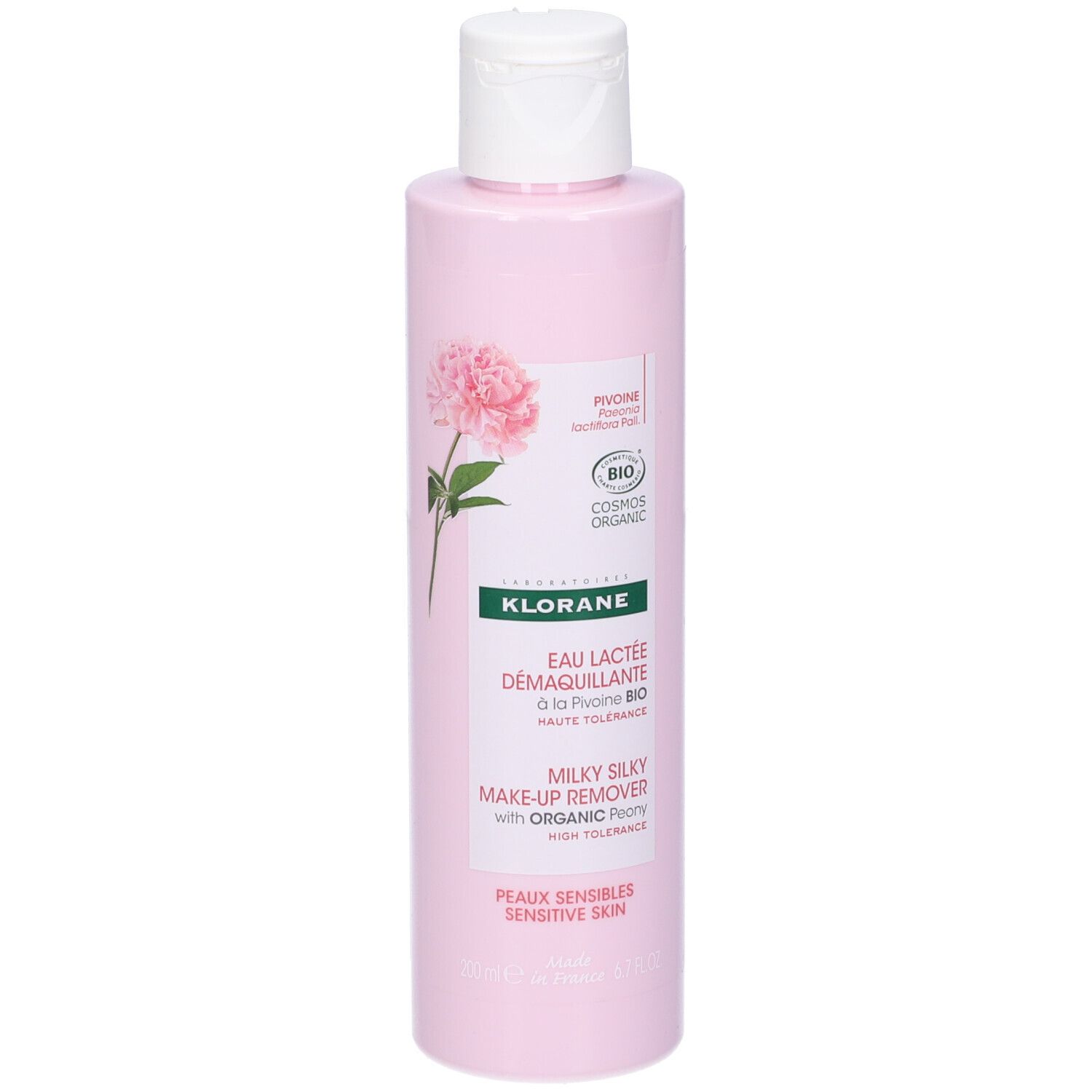 Flacone rosa con tappo bianco. Prodotto Klorane con fiore di peonia e testo. Certificazione bio.