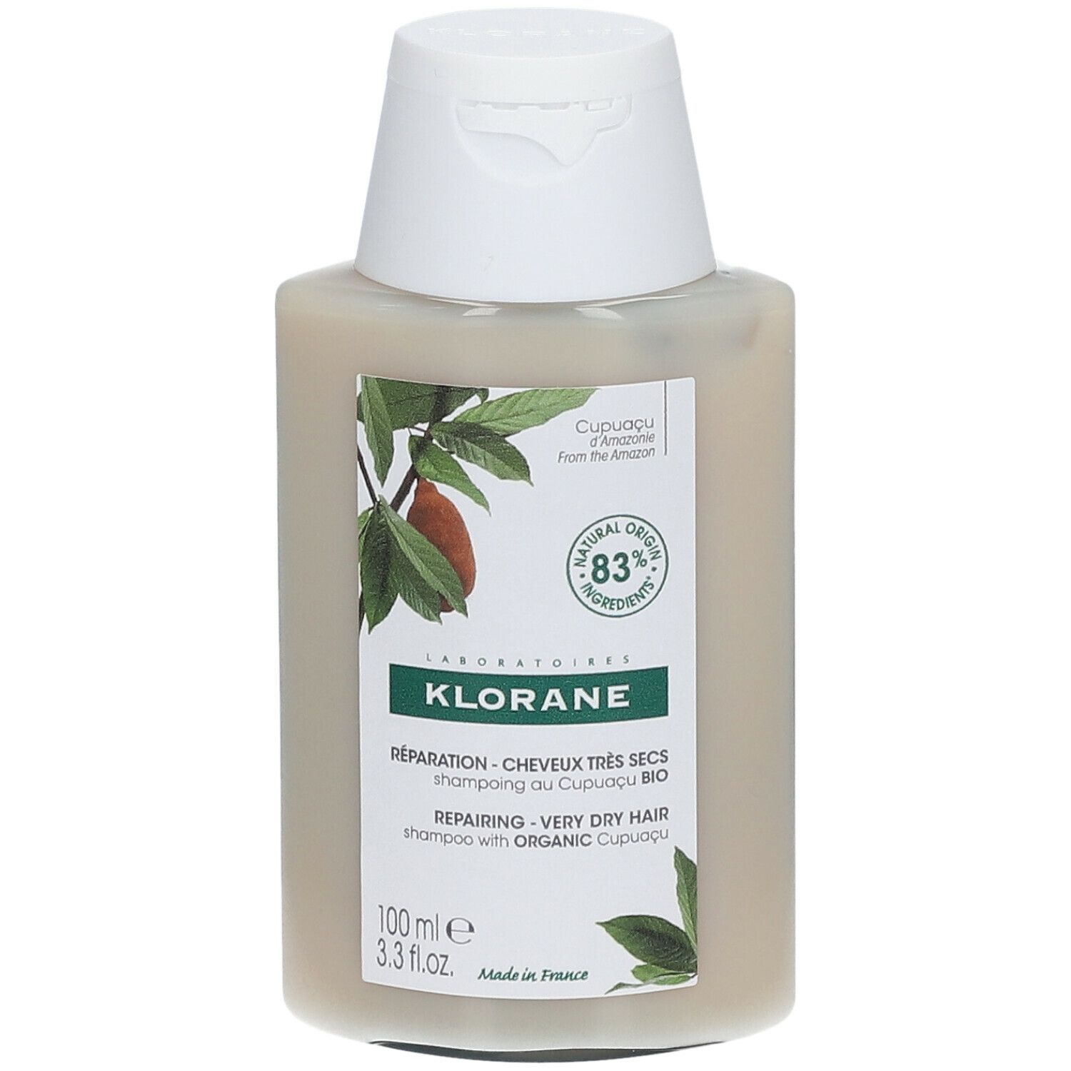 Flacone di shampoo Klorane con tappo bianco. Etichetta con testo e logo. 83% ingredienti di origine naturale.