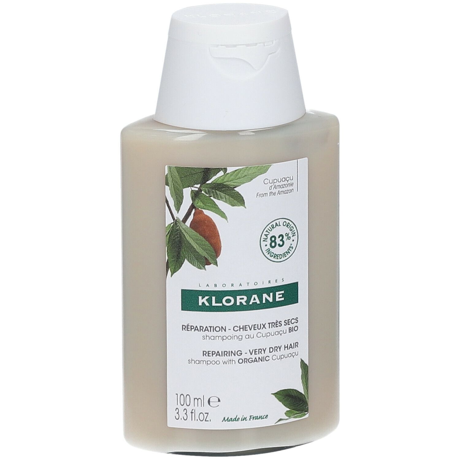 Flacone di shampoo Klorane con tappo bianco. Etichetta con testo e logo. 83% ingredienti di origine naturale.