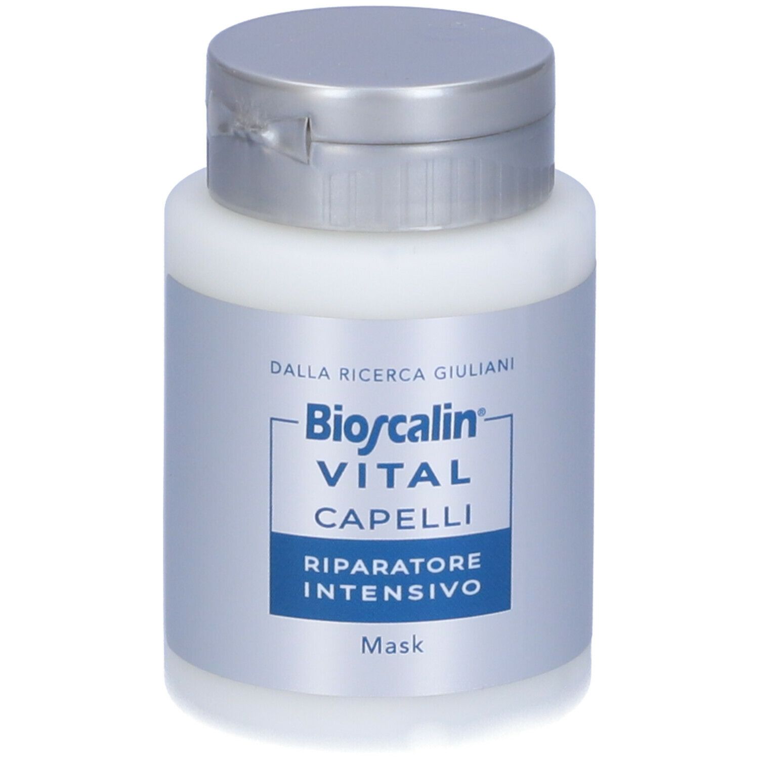 Prodotto bianco con tappo argentato. Scritta: Bioscalin VITAL CAPELLI Riparatore Intensivo.