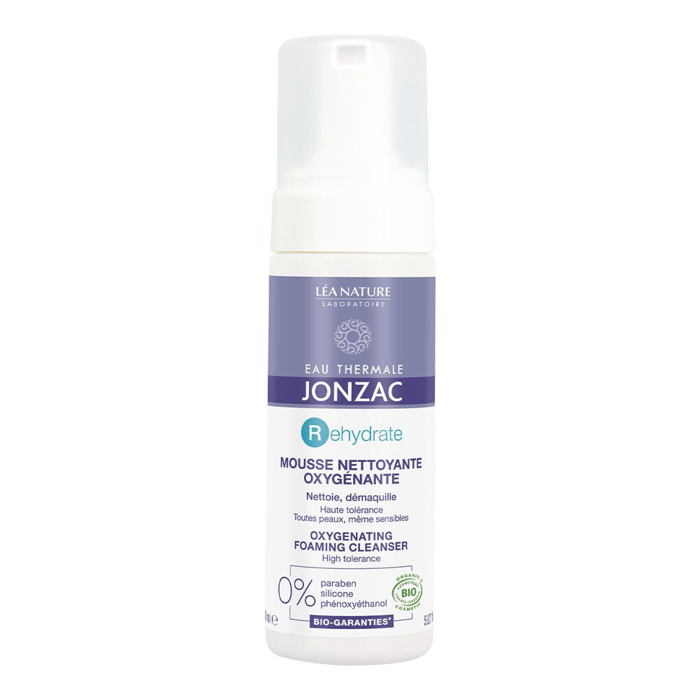 Flacone bianco con etichetta viola. Testo: Eau Thermale Jonzac, Rehydrate, Mousse Nettoyante Oxygénante. Certificazione bio.