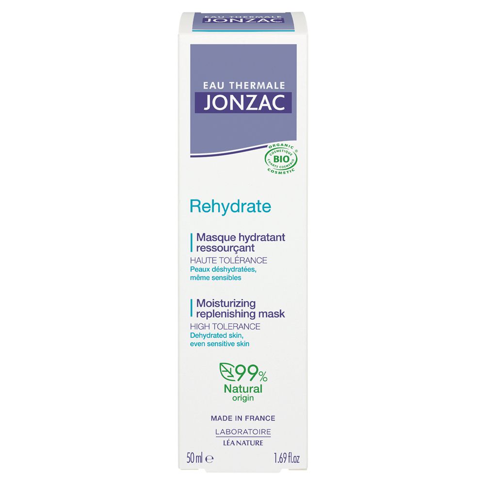 Weiße Verpackung mit lila Akzenten. Aufschrift: Eau Thermale Jonzac, Rehydrate, Masque hydratant, 99% Natural origin. Bio-Zertifizierung.