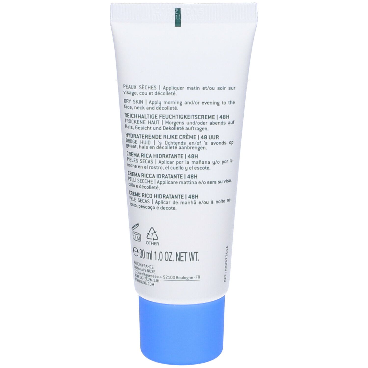 Retro di un tubo bianco con tappo blu. Testo multilingue. Informazioni sull'uso e sugli ingredienti.