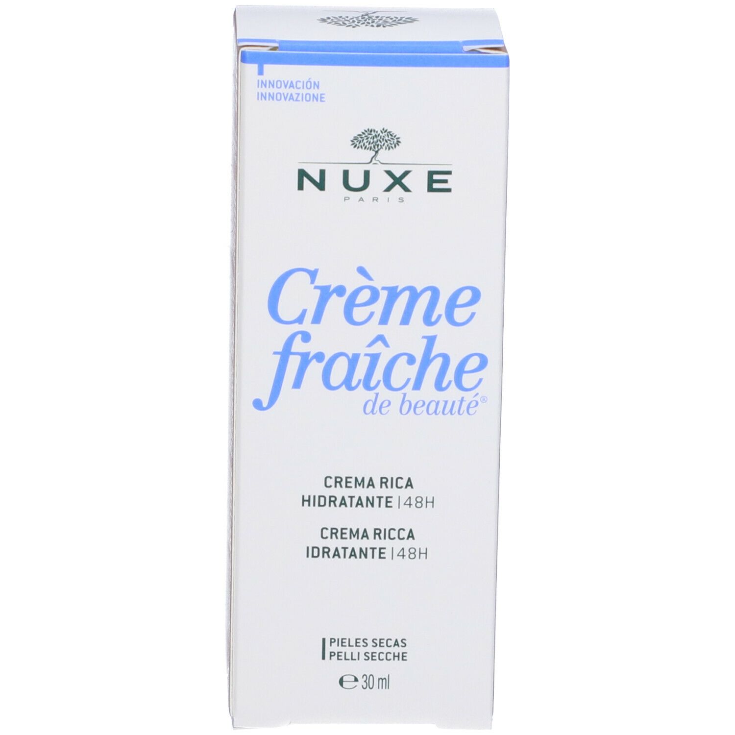 Confezione bianca con coperchio blu. Scritte: NUXE, Crème fraîche de beauté, Crème riche hydratante 48H, Pelli Secche.