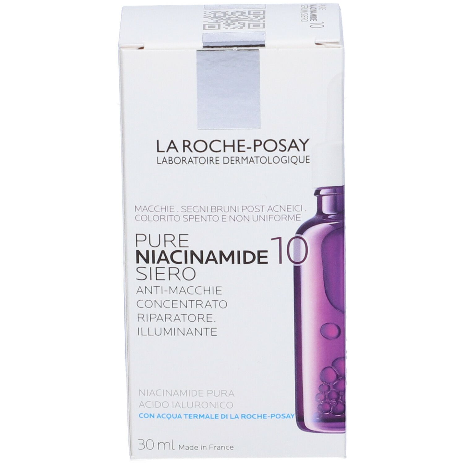 Scatola con flacone viola. Scritta: La Roche-Posay Pure Niacinamide 10 Serum. Scatola con testo.