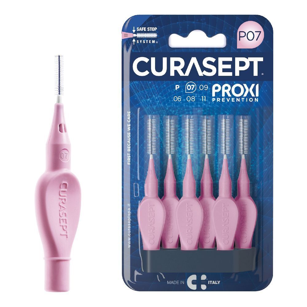 Spazzolino rosa con manico e setole. A destra, confezione di spazzolini rosa, marchio Curasept Proxi, P07.