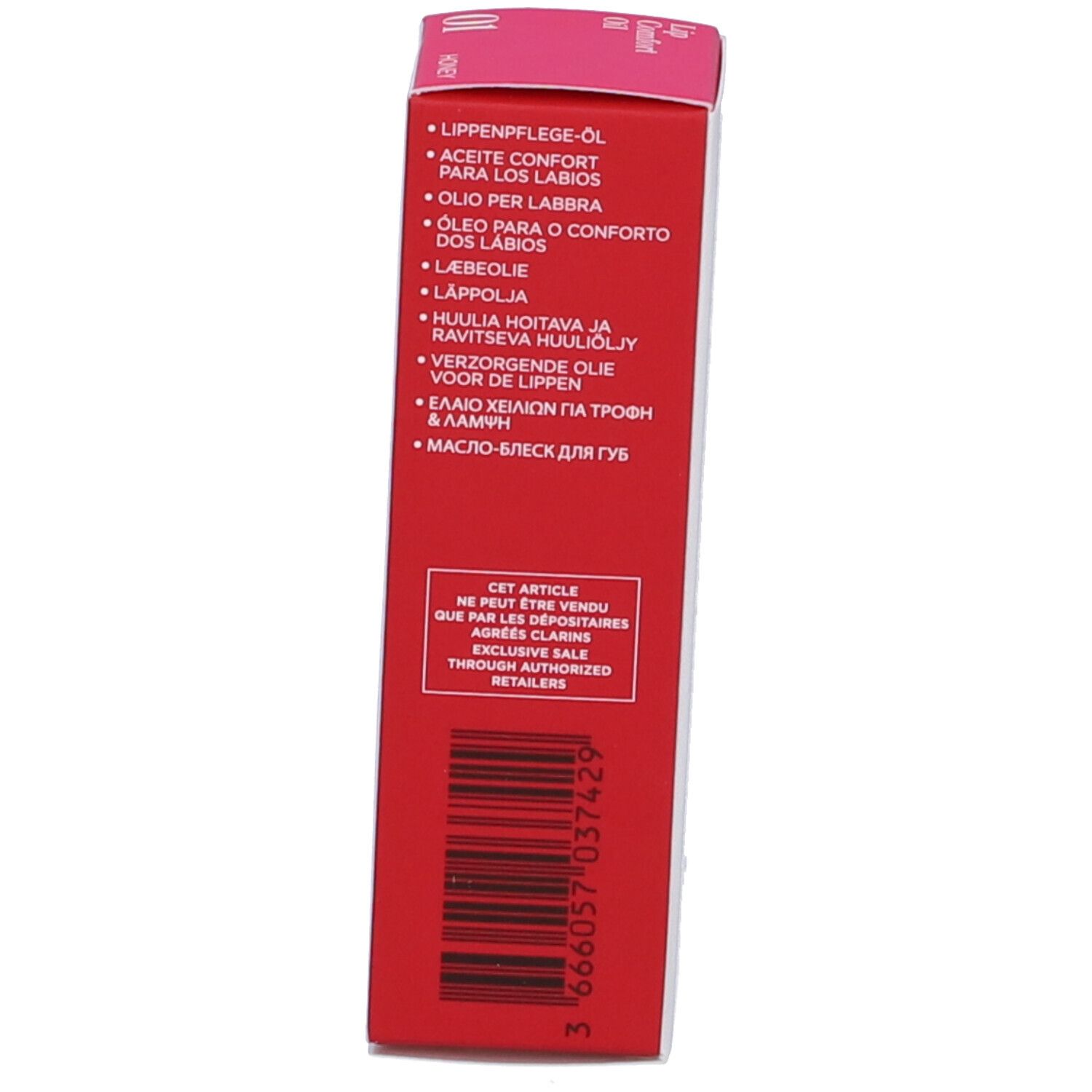 Lato della confezione Clarins Lip Comfort Oil. Scatola rossa con informazioni sul prodotto in diverse lingue.