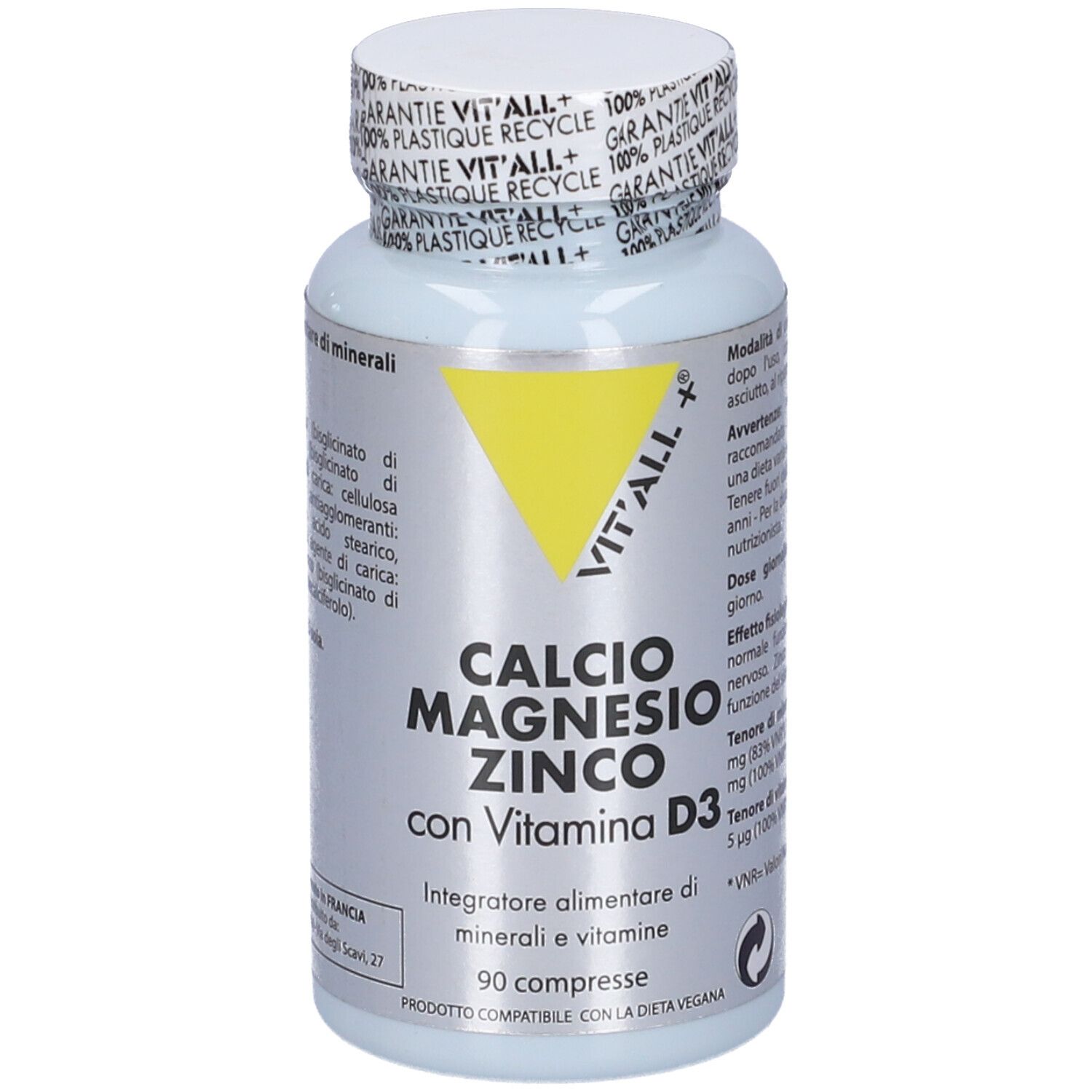 Flacone bianco con compresse. Scritta: Calcio Magnesio Zinco con Vitamina D3. 90 compresse. Triangolo giallo.