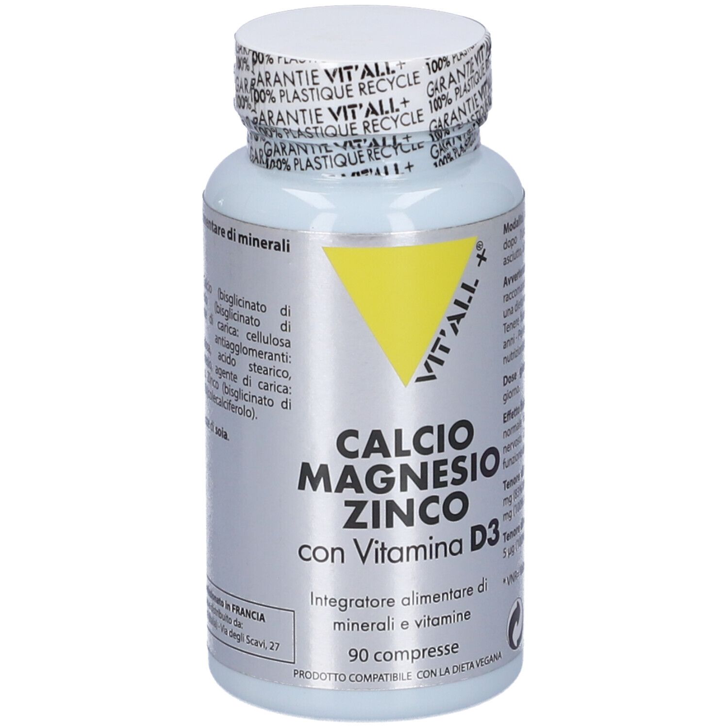 Flacone bianco con compresse. Scritta: Calcio Magnesio Zinco con Vitamina D3. 90 compresse. Triangolo giallo.