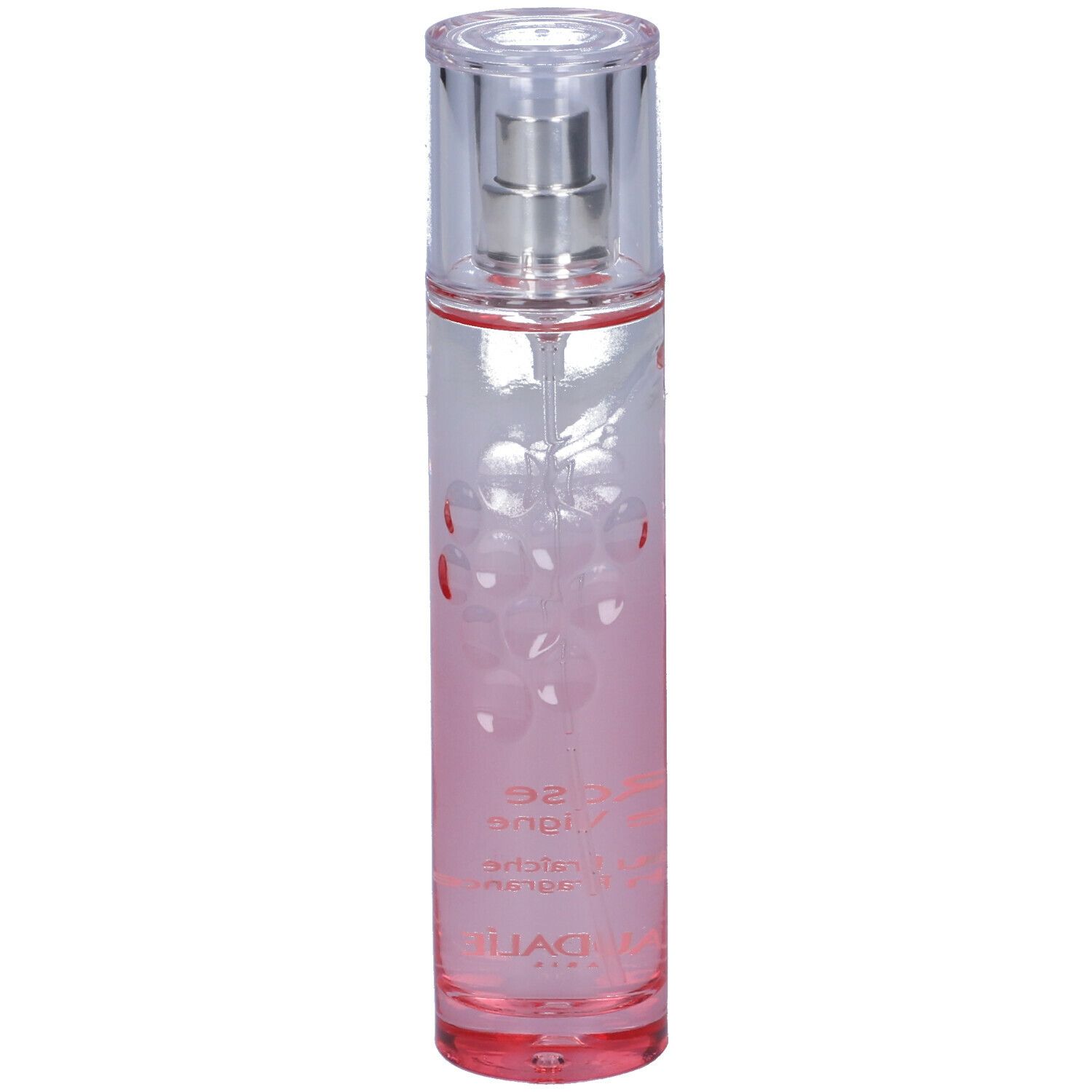 Liquido rosa in flacone trasparente con vaporizzatore. Scritta Rose de Vigne e Caudalie.