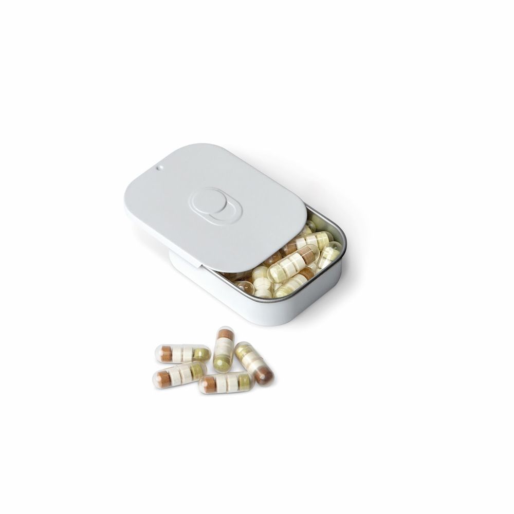 Scatola bianca aperta con capsule. Alcune capsule accanto. Capsule bicolore.