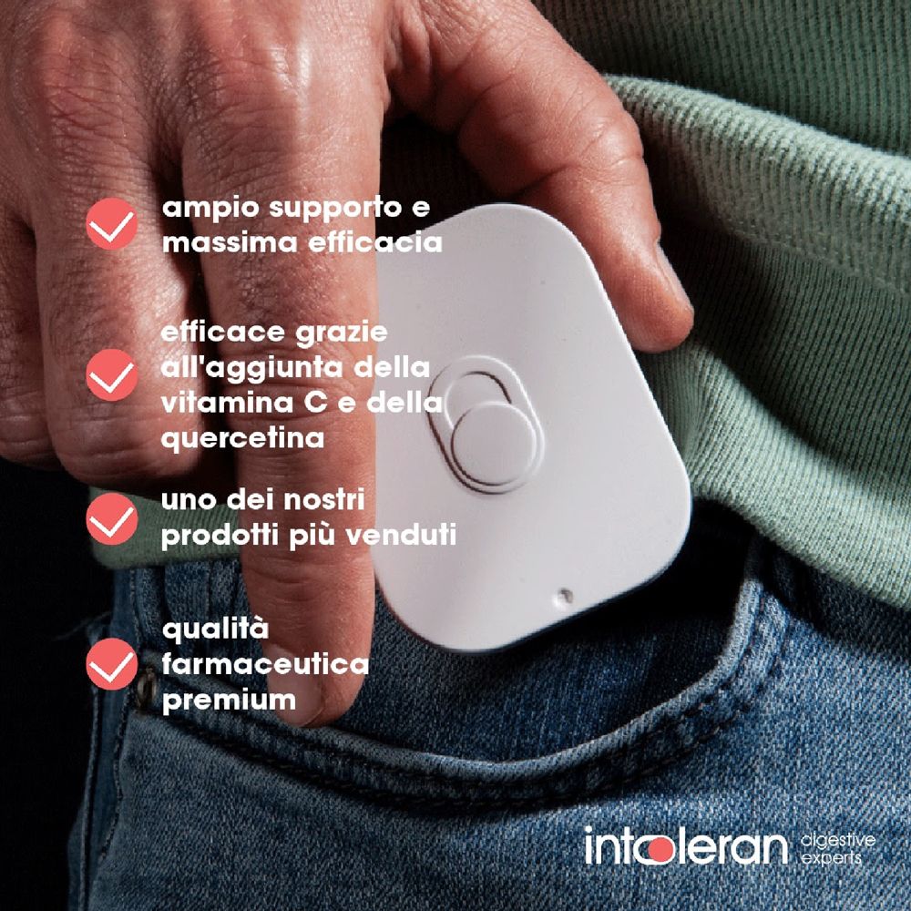 Dispositivo bianco in tasca. Segni rossi con testo. Marchio: Intoleran.