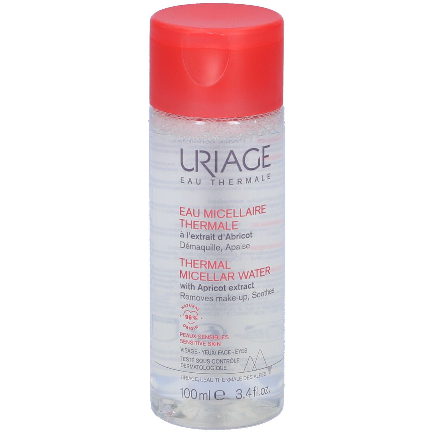Flacone di Acqua Micellare Termale URIAGE con tappo rosso. Contiene estratto di albicocca. Per pelli sensibili.