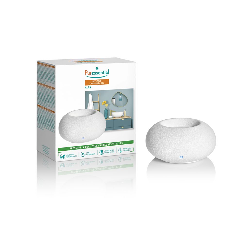 Diffusore bianco ovale, superficie ruvida. Confezione bianca con immagine del prodotto e logo.