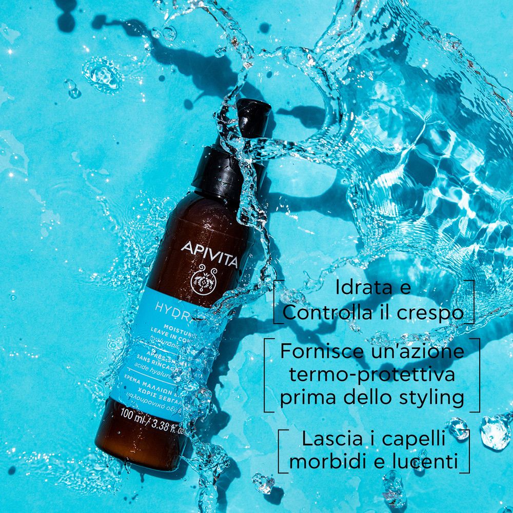 Flacone con dosatore nell'acqua. Testo: APIVITA, HYDRATION. Anti-crespo, protezione termica, capelli morbidi.