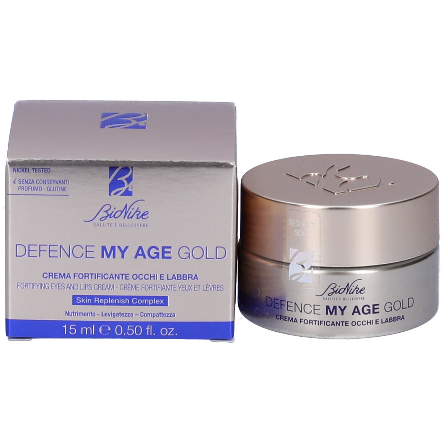 Creme-Dose und Schachtel. Aufschrift: Defence My Age Gold. 15 ml e 0.50 fl. oz. Für Augen und Lippen. Nickel getestet.