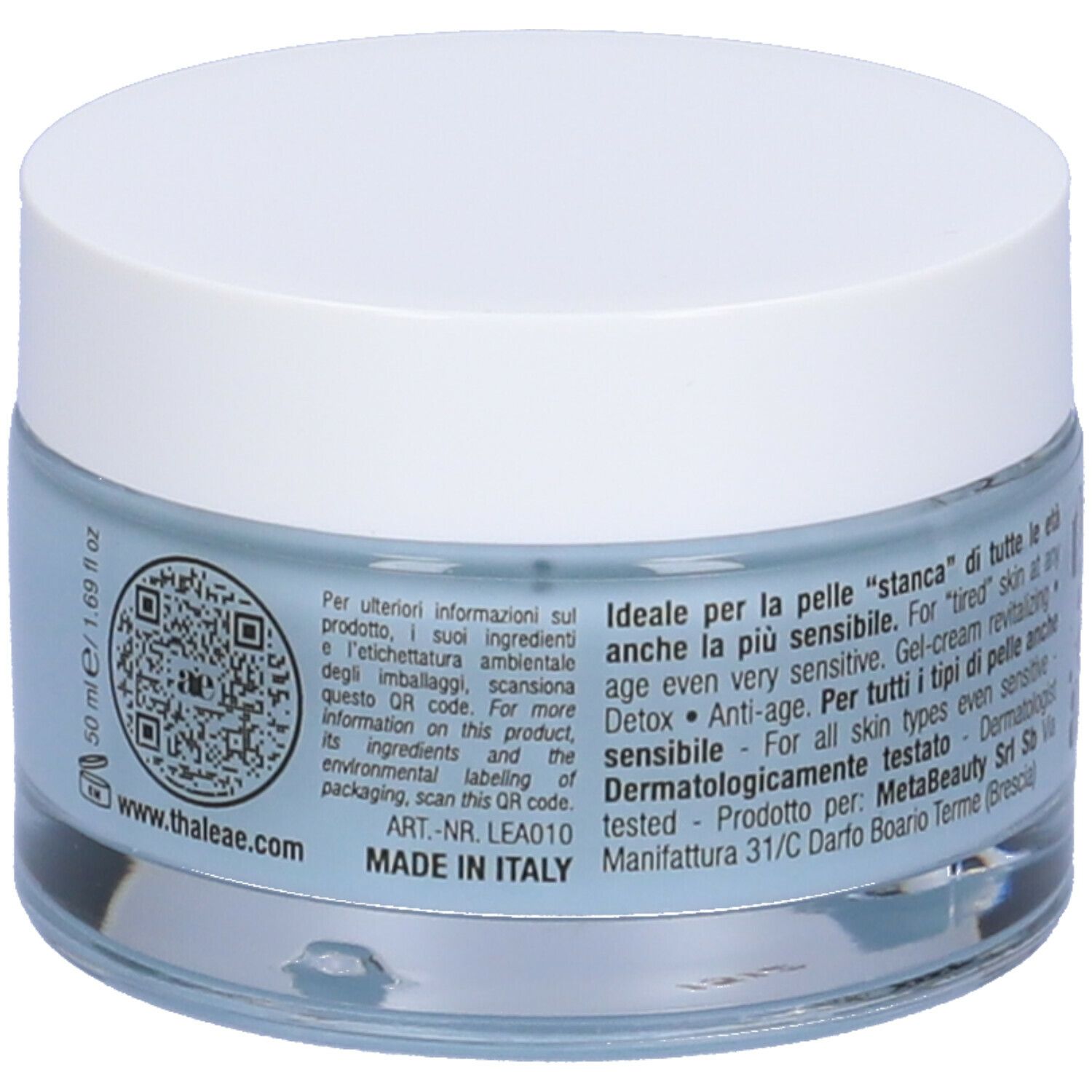 Vasetto di crema con coperchio bianco. L'etichetta dice: RE-AGE Crema rigenerante viso. Liquido blu visibile.
