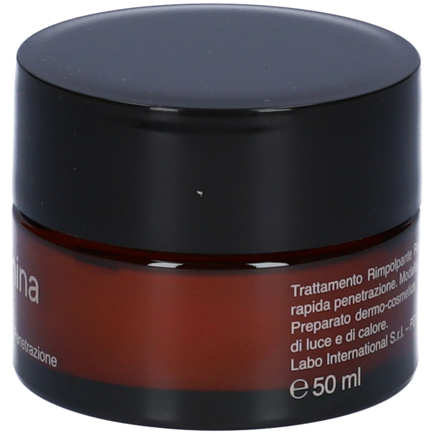 Vaso di crema marrone con coperchio nero. Testo in italiano. Scritta: e 50 ml.