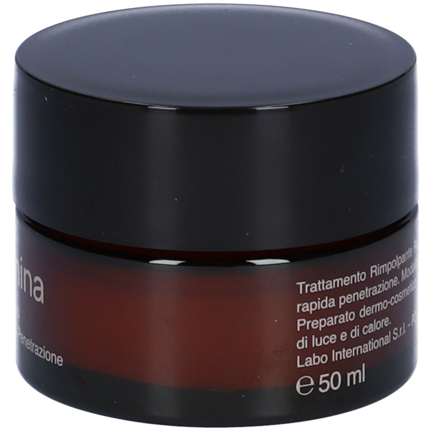 Vaso di crema marrone con coperchio nero. Testo: Trattamento, istruzioni per l'uso, prodotto in Italia, 50 ml.