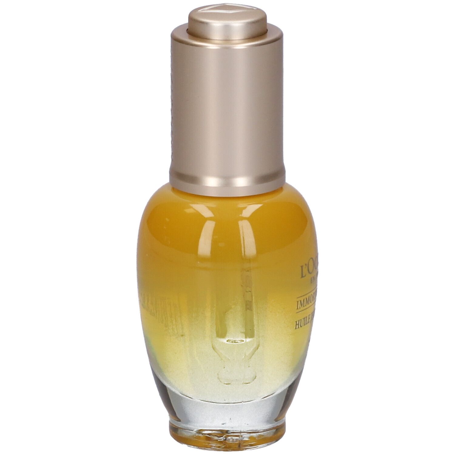 Flacone giallo trasparente, tappo dorato e pipetta. Scritte: Immortelle Divine, Huile Jeunesse Divine.