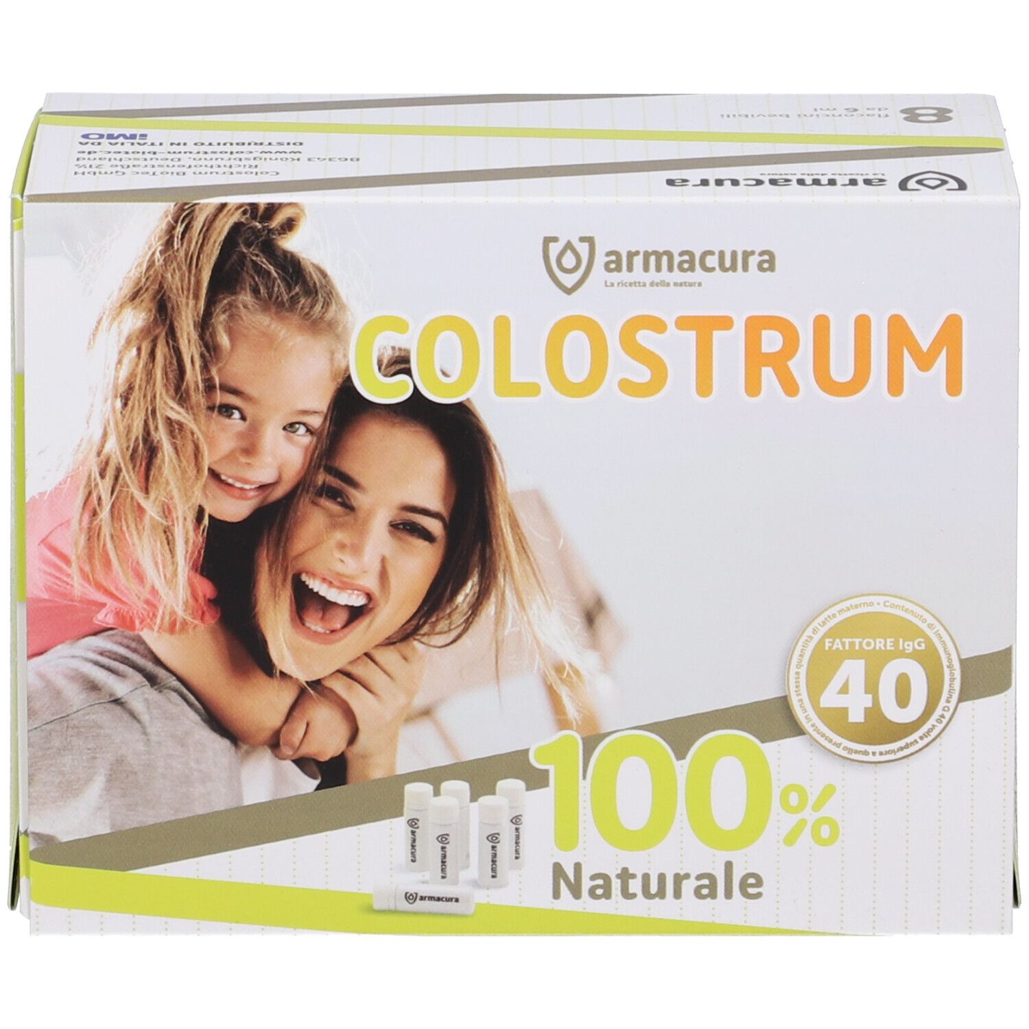 Scatola Armacura Colostrum. Scritto: Colostrum, 100% naturale, 8 flaconcini, logo Armacura, donna e bambino.