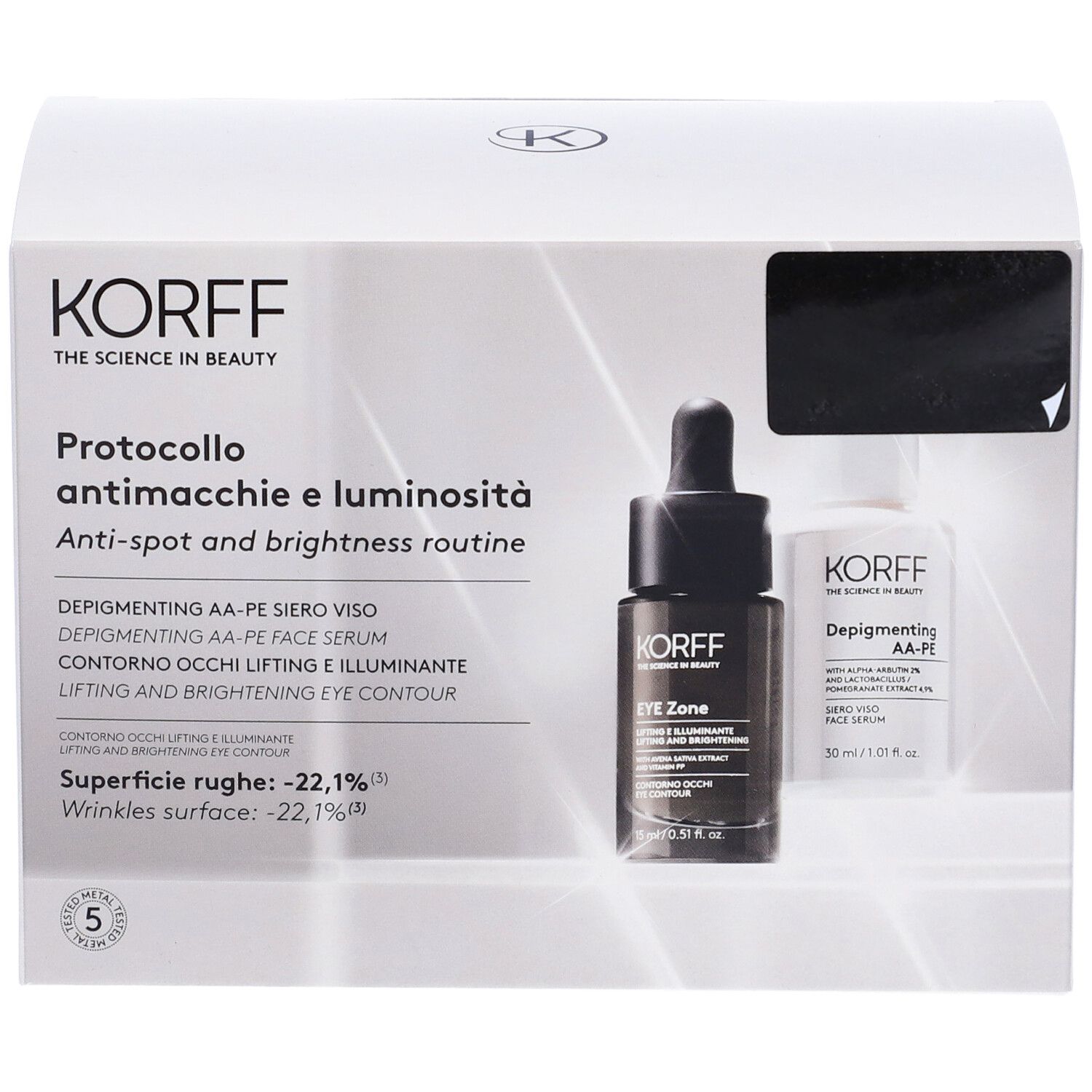 Confezione KORFF. Contiene due flaconi. Testo: Protocollo antimacchie e luminosità, routine anti-macchie e luminosità.