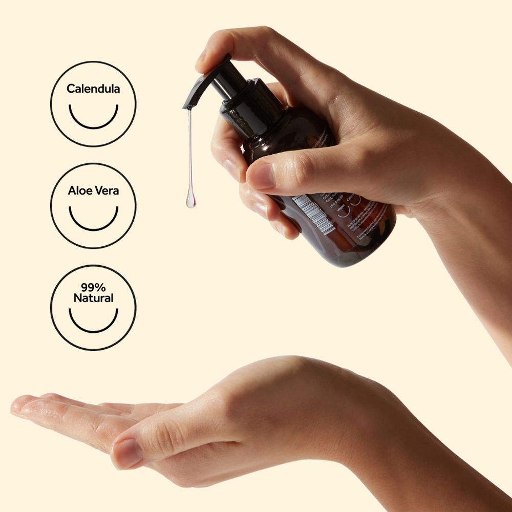 Flacone marrone con dispenser nero. Goccia. Simboli: Calendula, Aloe Vera, 99% Natural.