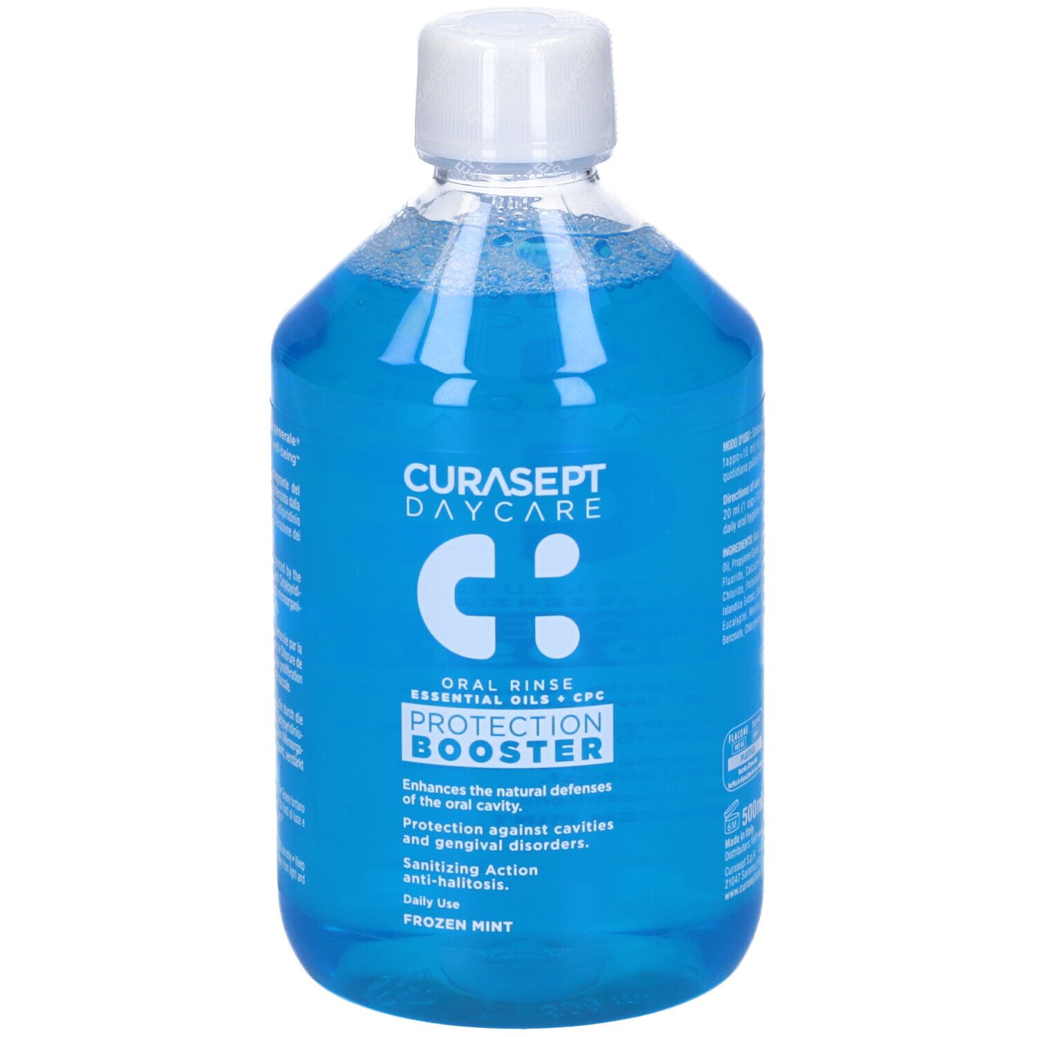 Collutorio in bottiglia trasparente con tappo bianco. Liquido blu. Testo: CURASEPT DAYCARE, PROTECTION BOOSTER.