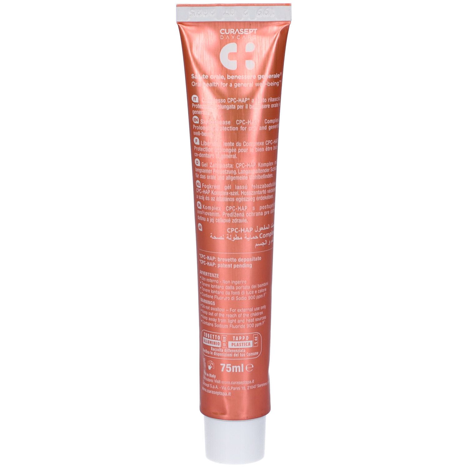 Retro di un tubetto di dentifricio rosa. Testo multilingue. Contiene 75ml. Con certificazioni.