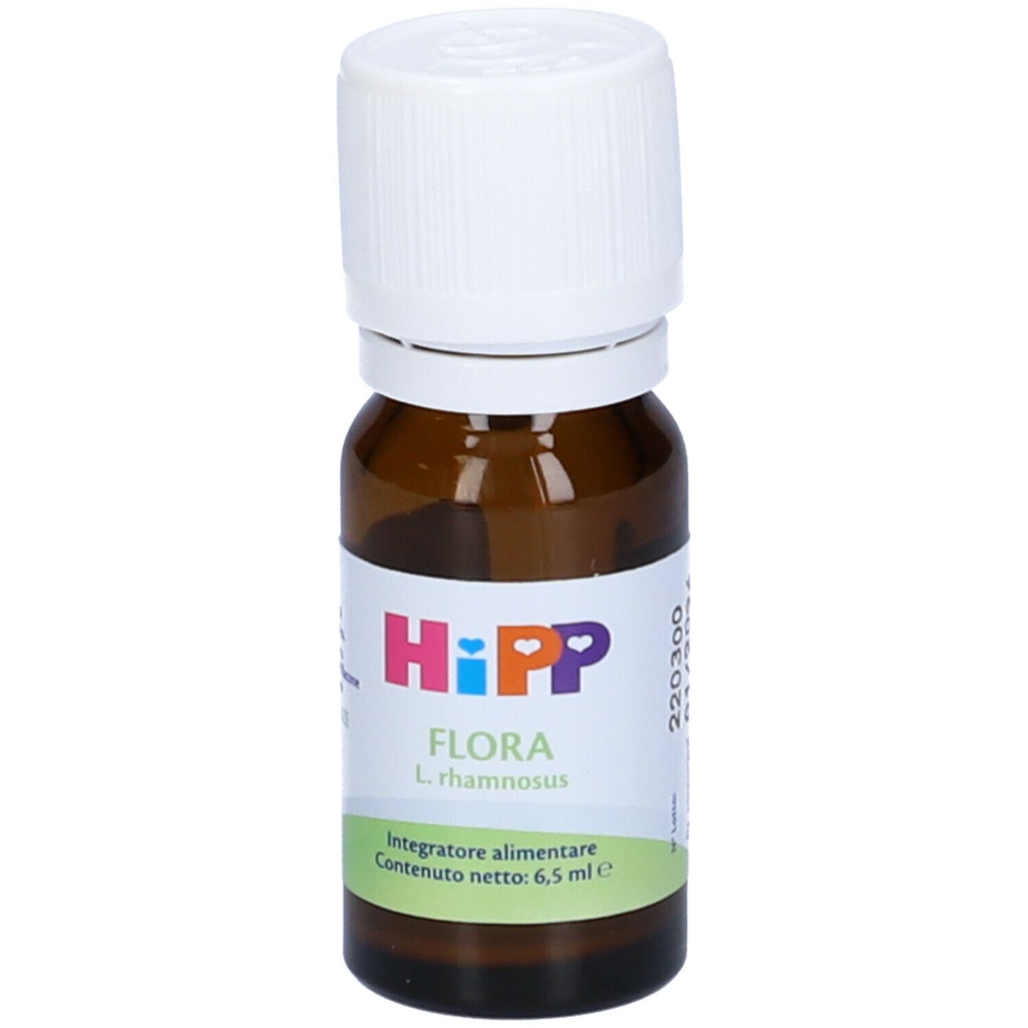 Flacone di vetro marrone con tappo bianco. Etichetta con logo HiPP e nome del prodotto Flora. Contenuto: 6,5 ml.
