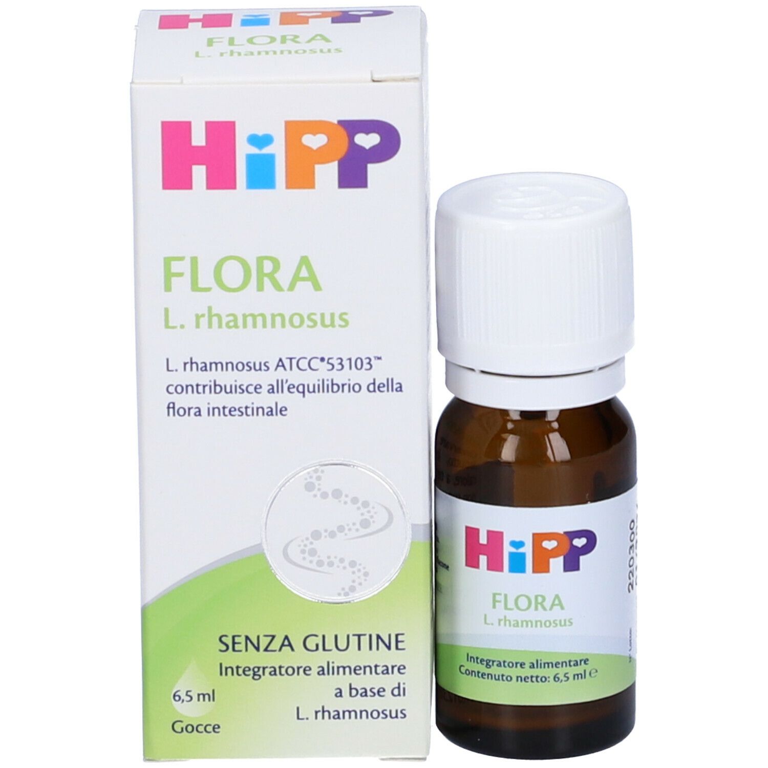 Flacone di vetro marrone con tappo bianco e confezione. Confezione con logo HiPP e nome del prodotto Flora. Contenuto: 6,5 ml.