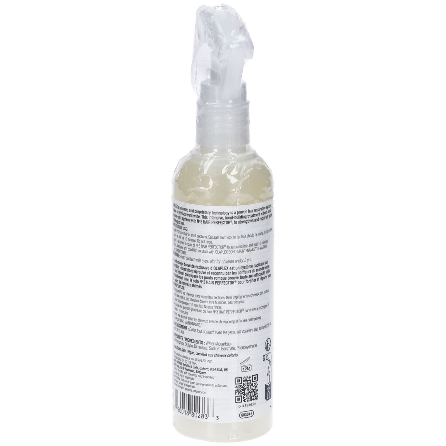 Klare Sprühflasche mit weißem Etikett und transparentem Sprühkopf.