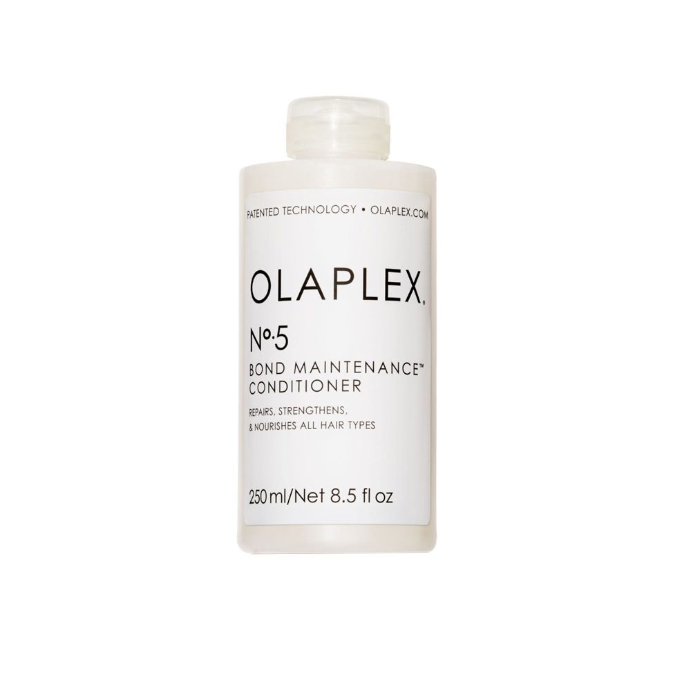 Flasche OLAPLEX No.5 Bond Maintenance Conditioner. Weißes Etikett mit Produktinformationen. 250ml/8.5 fl oz.