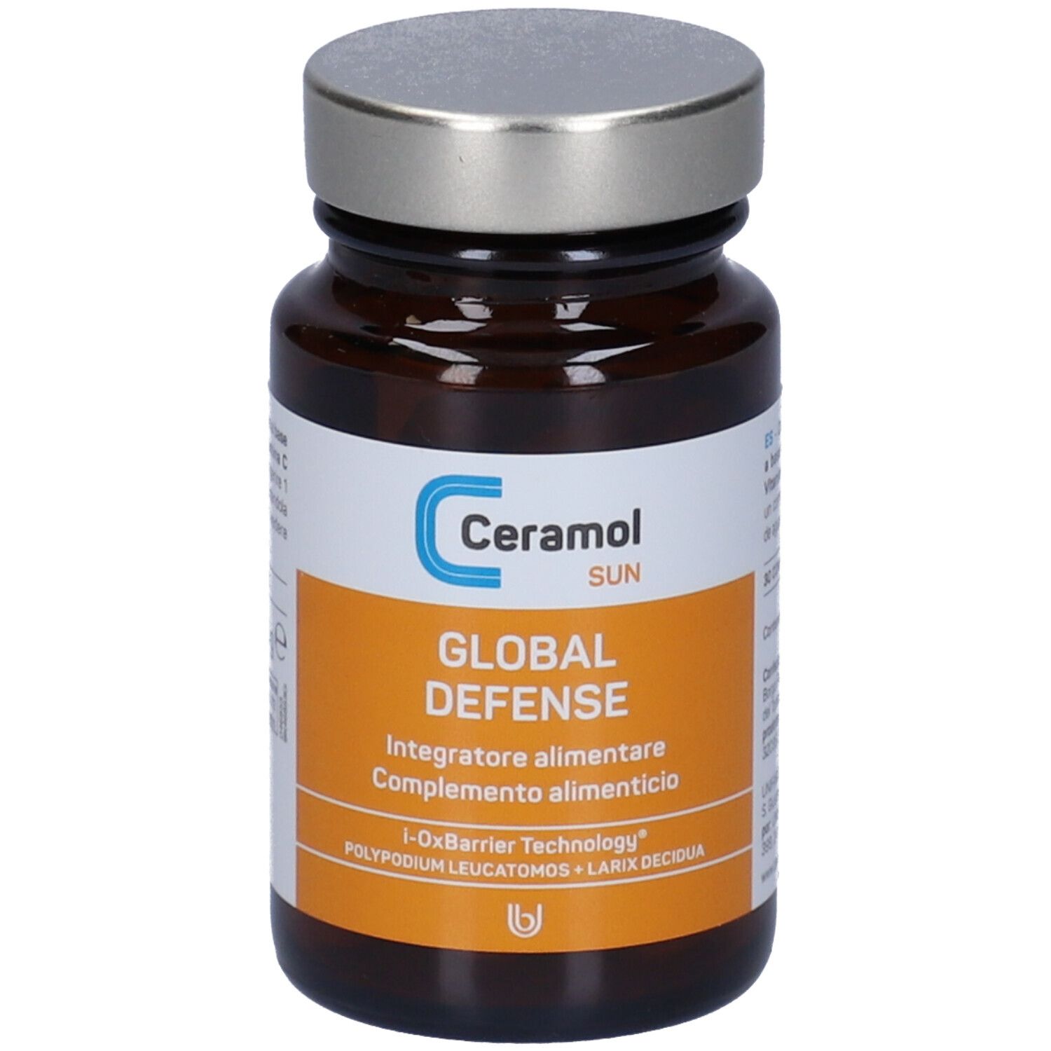 Flacone di vetro marrone con tappo argentato. Etichetta con testo: Ceramol SUN, GLOBAL DEFENSE, integratore alimentare.