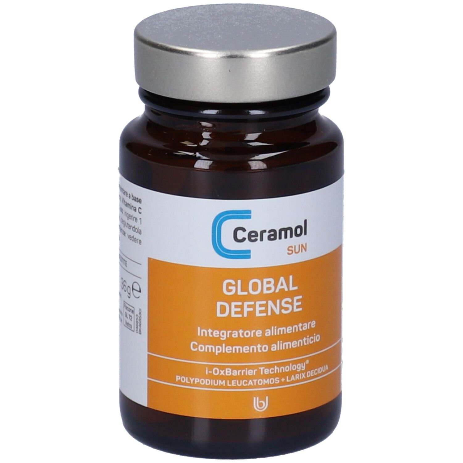 Flacone di vetro marrone con tappo argentato. Etichetta con testo: Ceramol SUN, GLOBAL DEFENSE, integratore alimentare.