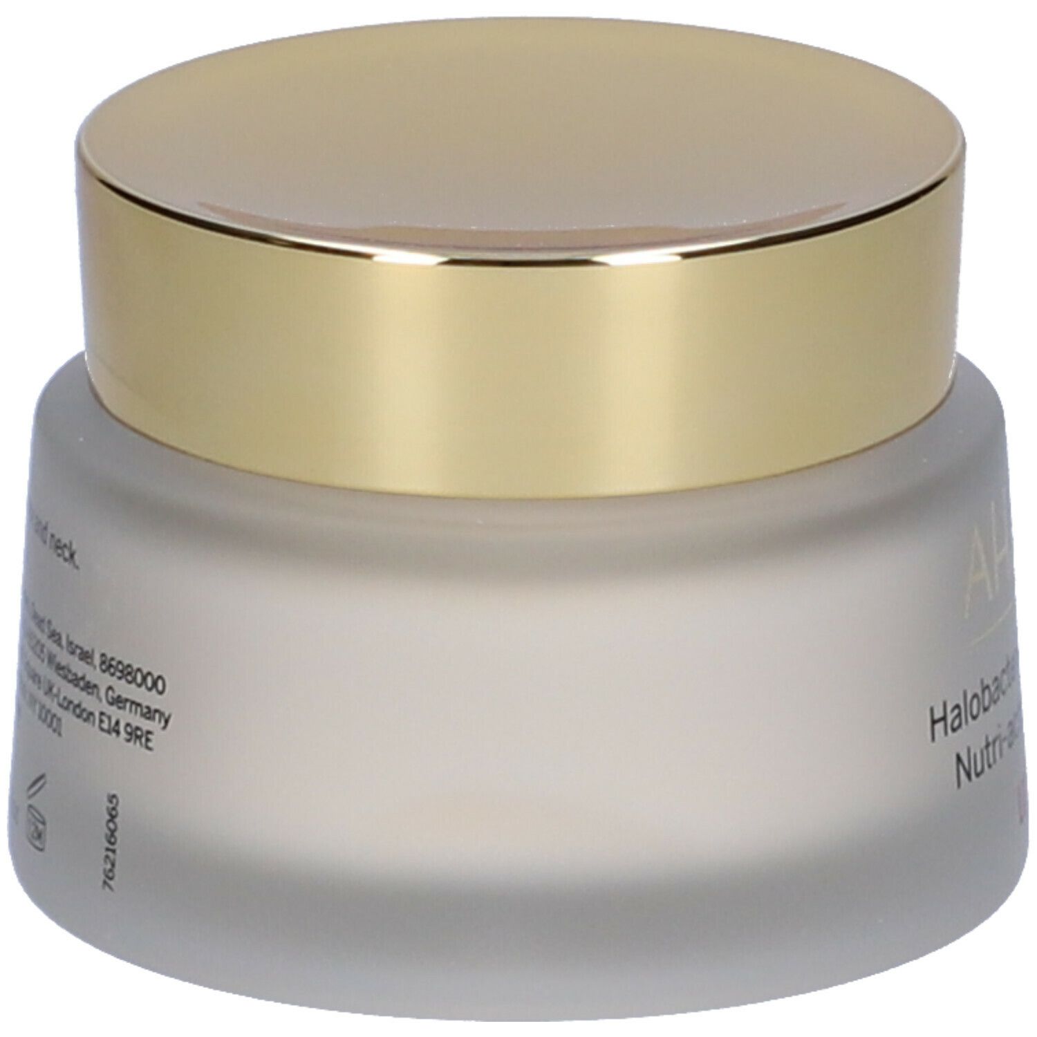 Vaso di crema con coperchio dorato. Scritta: AHAVA, Halobacteria Restoring Nutri-action Cream.