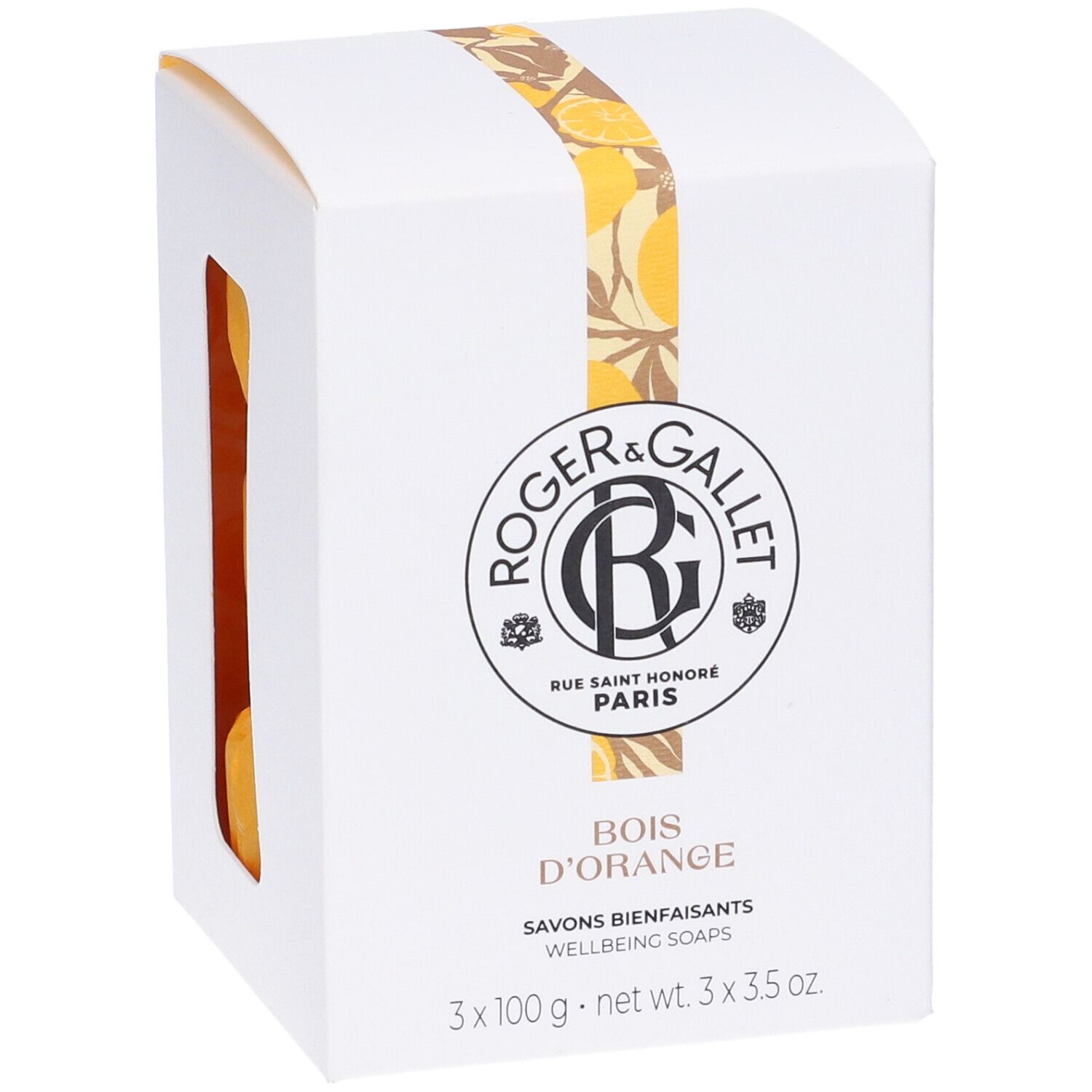 Scatola bianca con logo, nome del prodotto e nastro giallo. Tre saponi arancioni visibili.