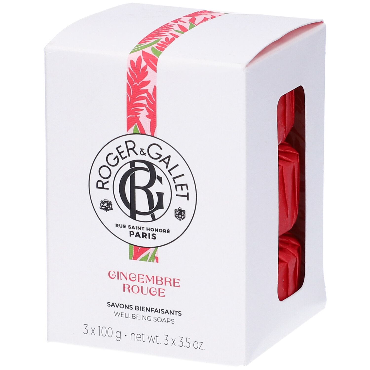 Scatola bianca con set di saponette rosse. Logo e nome del prodotto visibili. Finestra.