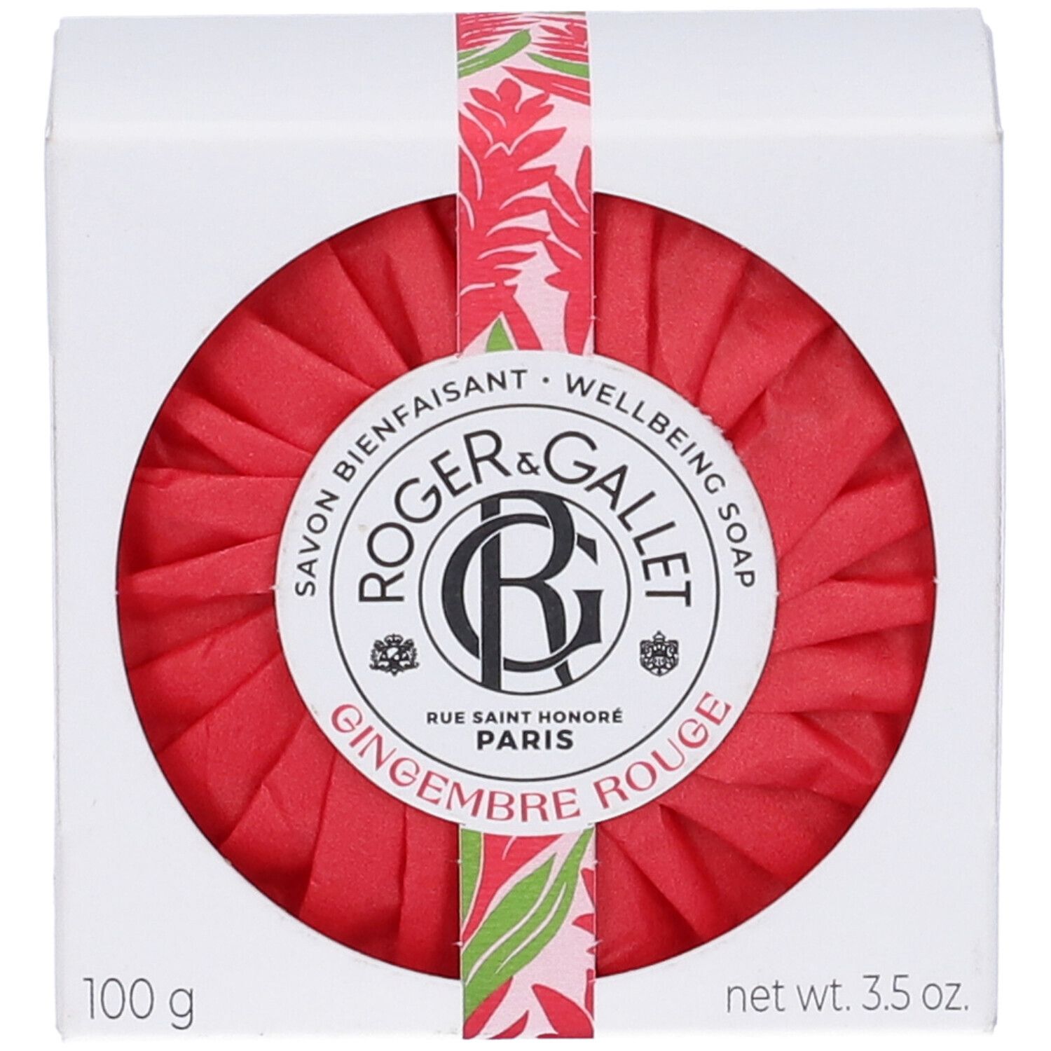 Sapone rosso rotondo in scatola bianca. Scritta: ROGER & GALLET, GINGEMBRE ROUGE. Con nastro floreale. 100 g.