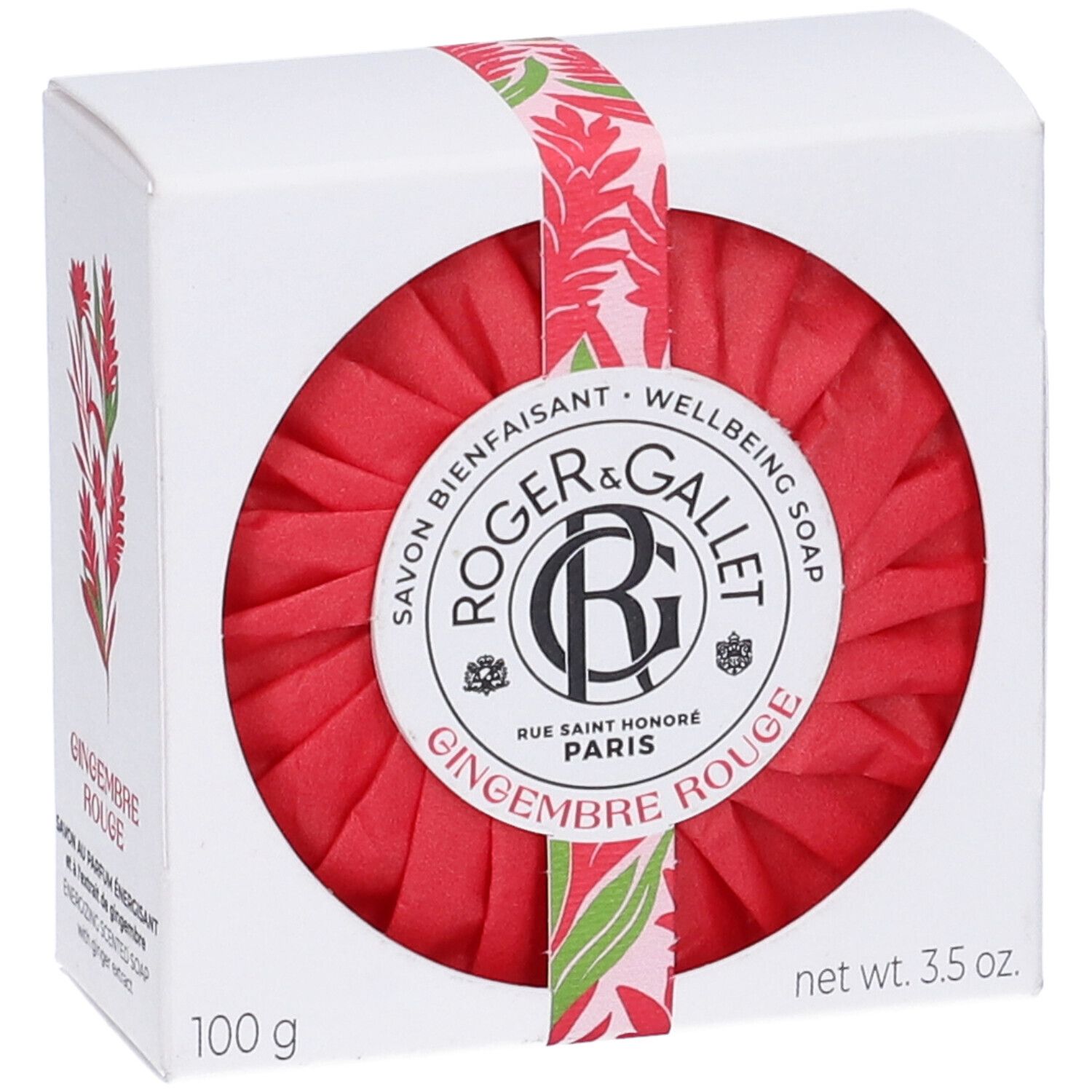 Sapone rosso rotondo in scatola bianca. Scritta: ROGER & GALLET, GINGEMBRE ROUGE. Con nastro floreale. 100 g.