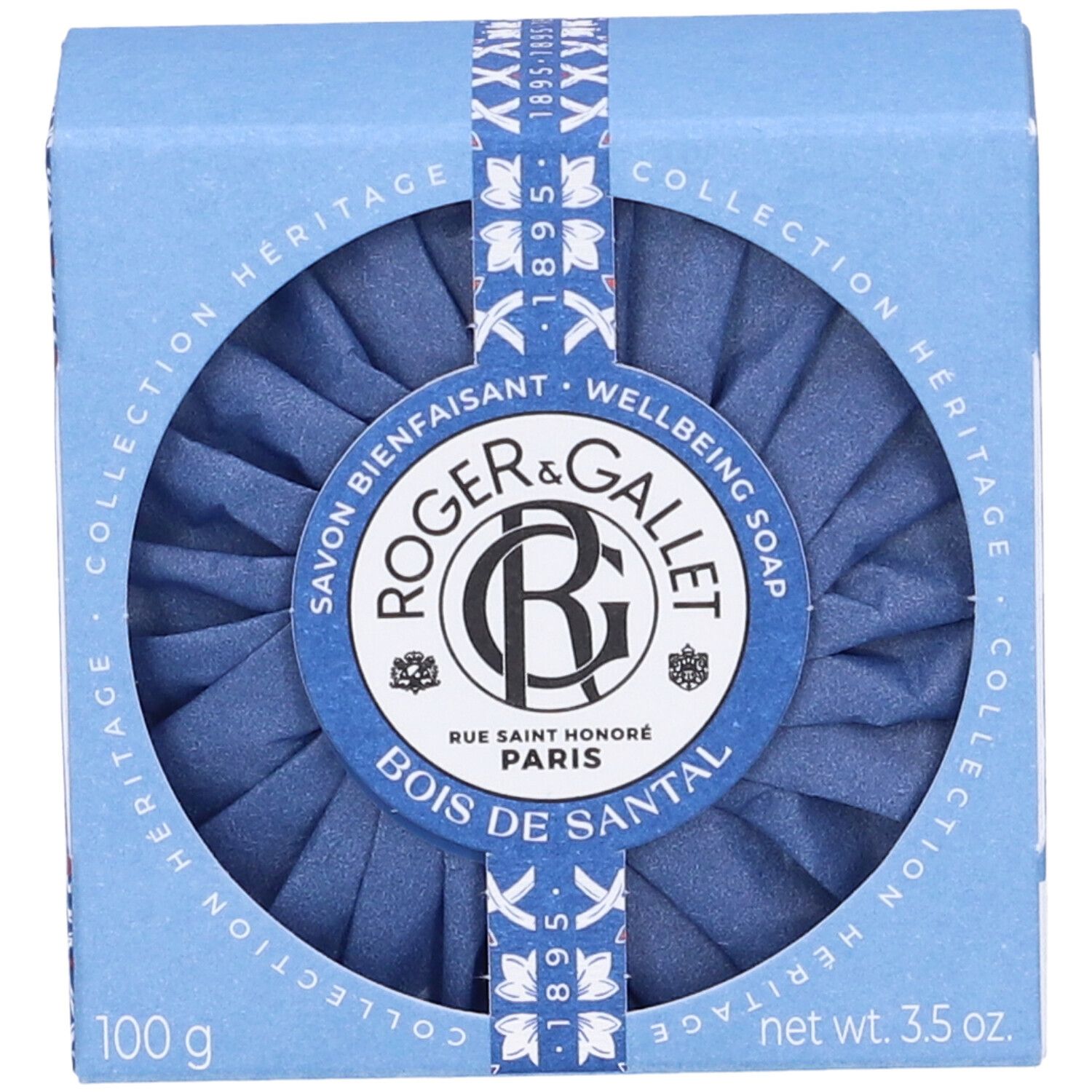 Scatola blu con apertura rotonda. Roger&Gallet Bois de Santal Saponetta. 100g. 3.5 oz. Confezione con nastro blu.