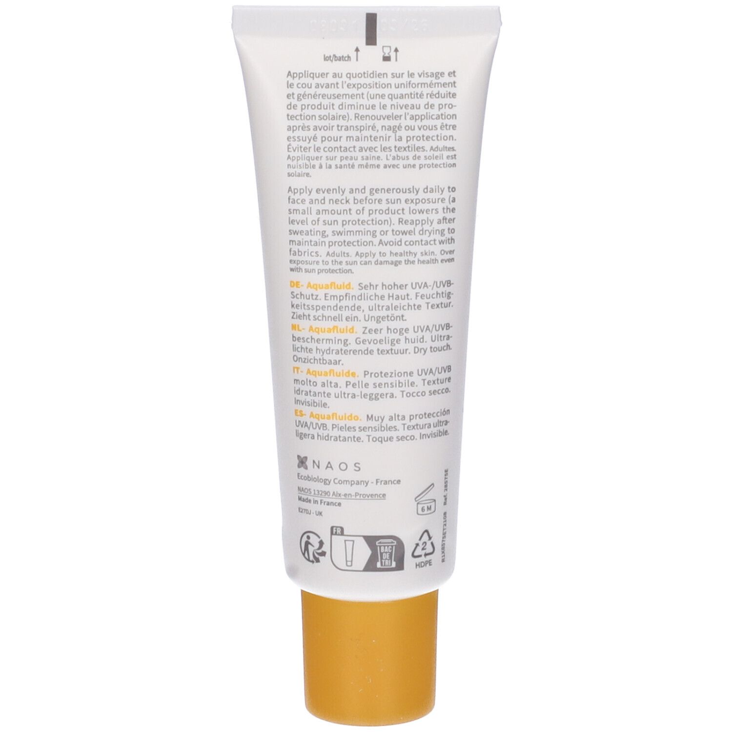 Retro del tubo di crema solare. Testo multilingue, tra cui italiano. Tappo giallo.