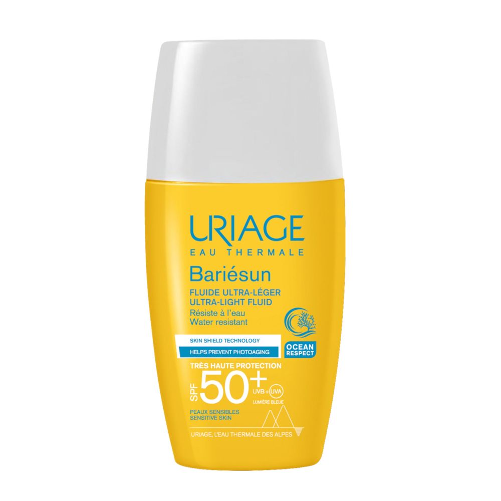 Uriage Bariésun Fluido. Flacone giallo con tappo bianco. Testo: SPF 50+, Fluido Ultra-Leggero, Resistente all'acqua.