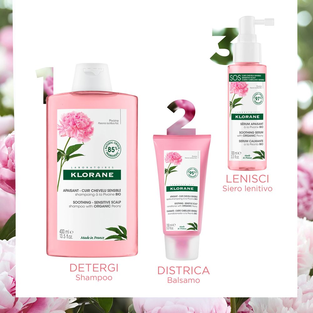 Tre prodotti Klorane: shampoo, balsamo e siero. Tutti con illustrazioni di peonie e loghi. Confezione rosa.